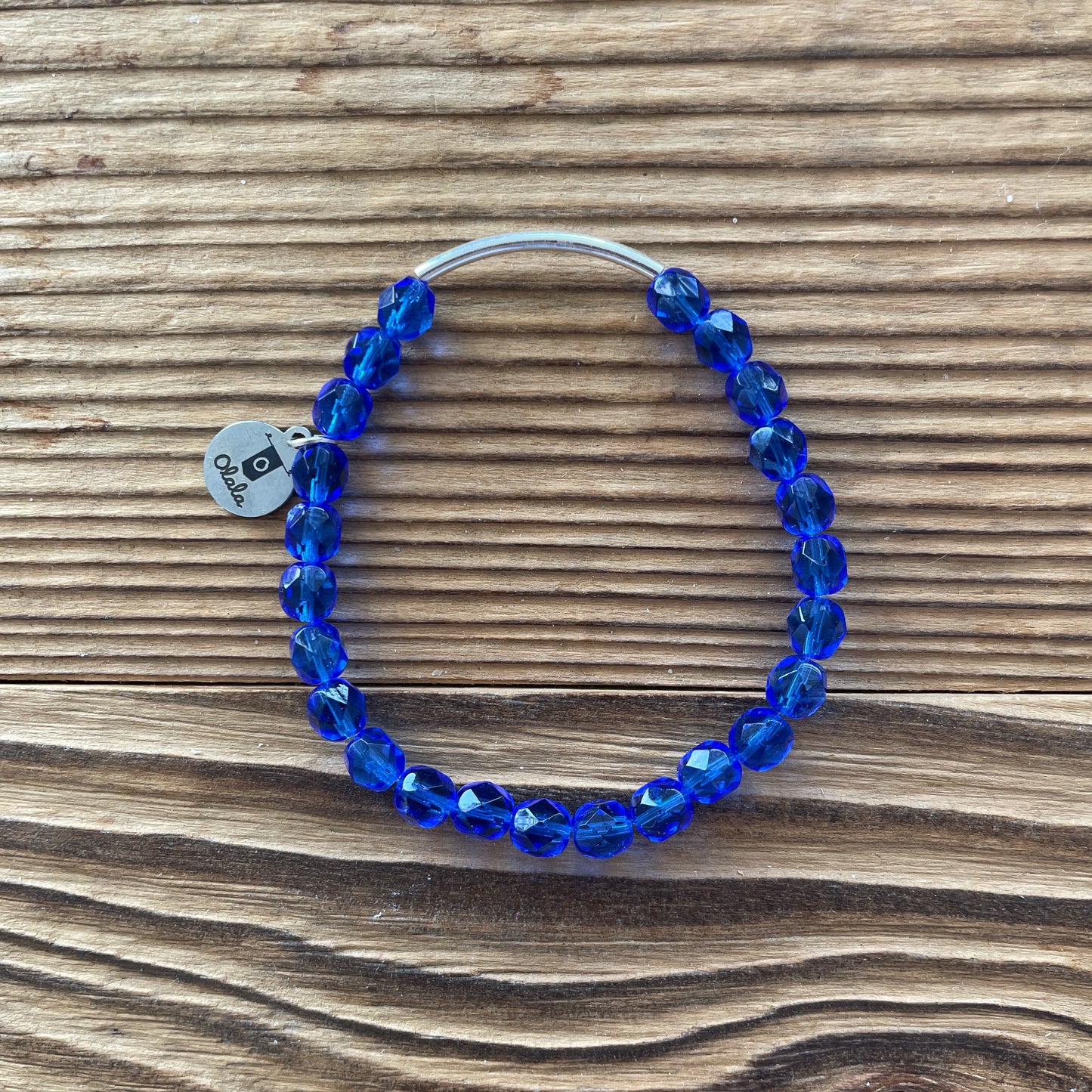 Bracelet facettes de bohème bleu rois et tige courbée en acier