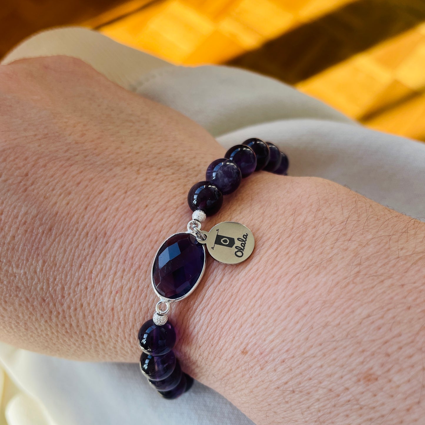 Bracelet en perles d'Améthyste et entretoise en argent 925.