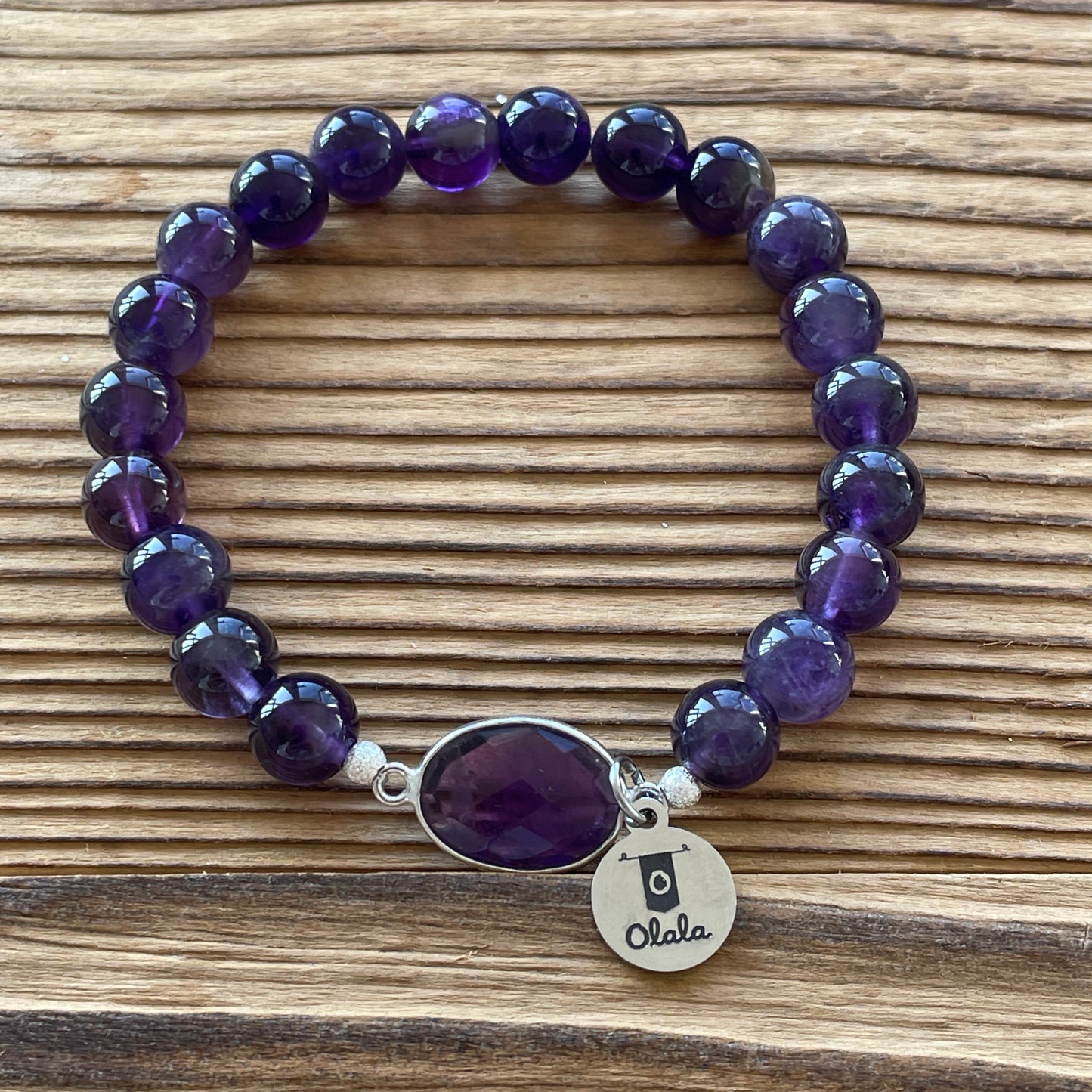 Bracelet en perles d'Améthyste et entretoise en argent 925.