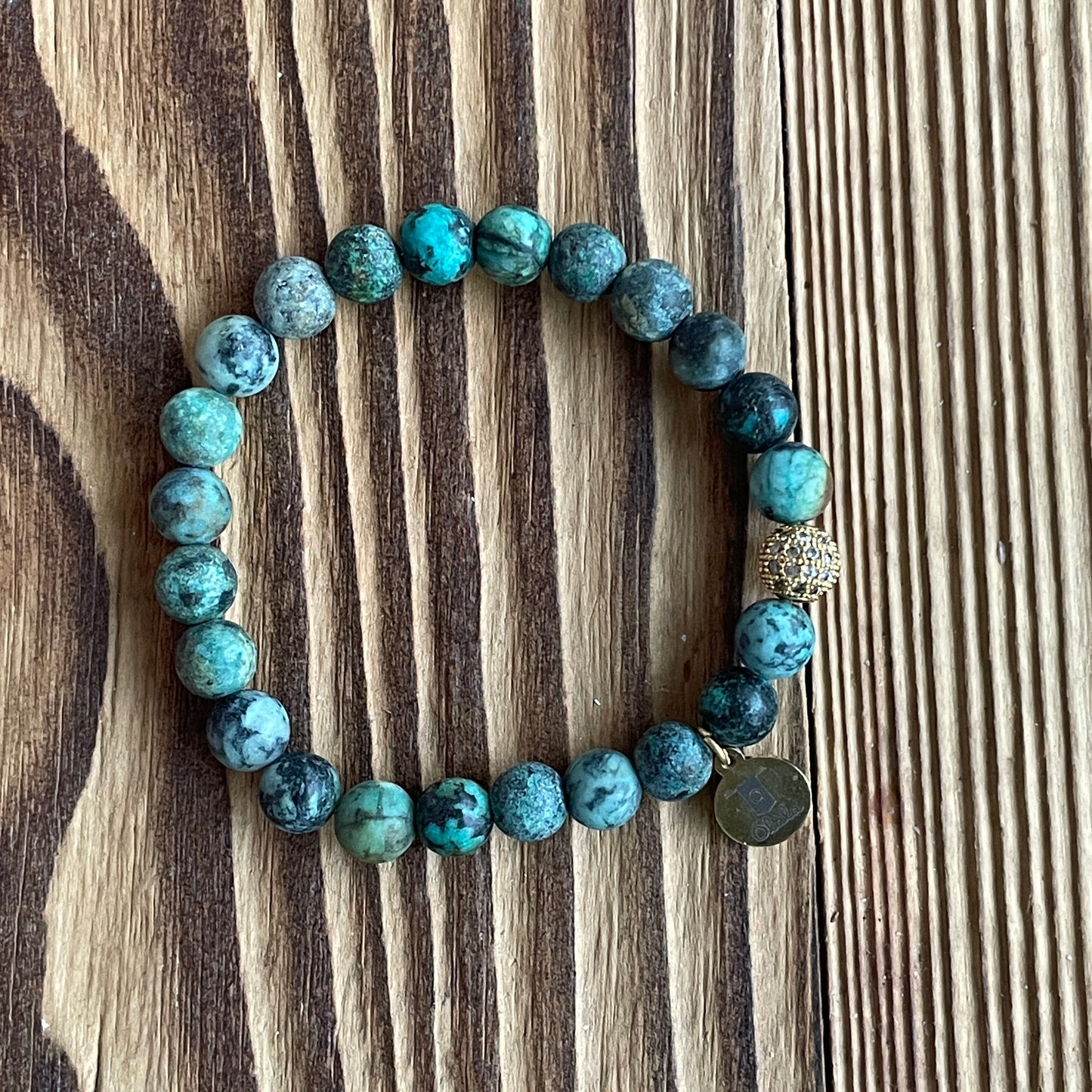 Bracelet Jaspe verte mate et boule filigranée dorée